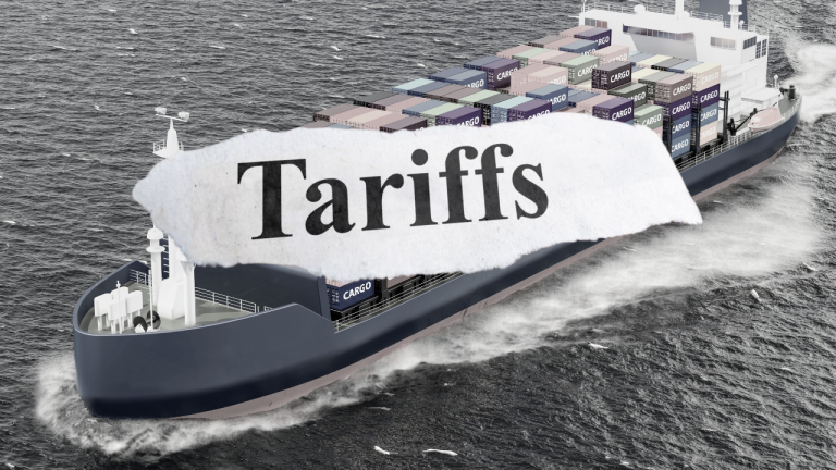 cargo ship with tariff banner stretched across image